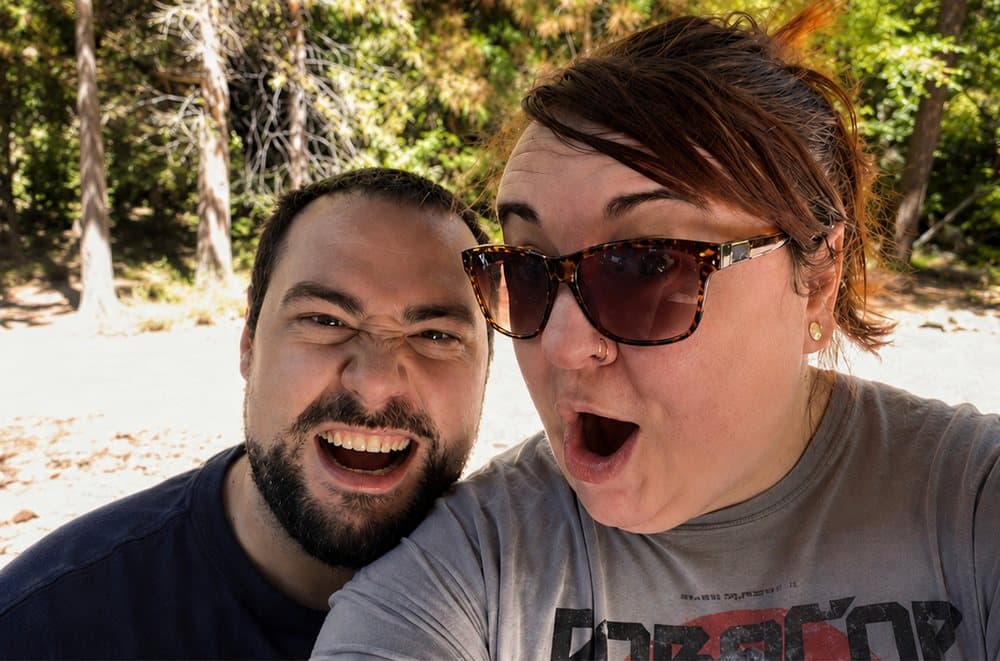 Robbie and Caitlin pulling excited faces on their Yosemite road trip